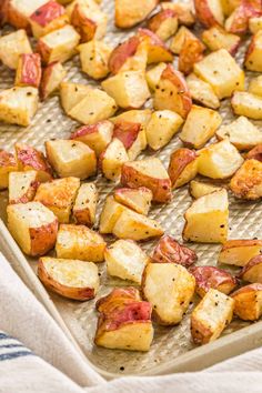 cooked potatoes and bacon on a baking sheet