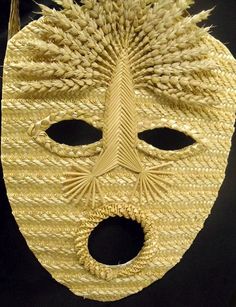 a mask made out of straw is shown