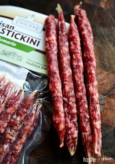 some meat sticks are sitting on a table