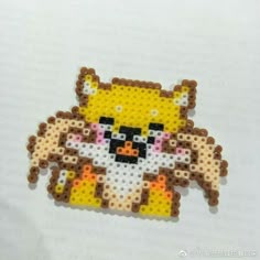 an image of a cross stitch bead pattern that looks like it has a cat on it