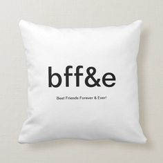 a black and white pillow with the words bff & e on it's front