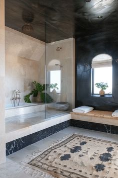 a bathroom with a rug, sink and window in the corner on the wall next to the bathtub