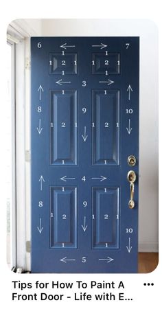 a blue door with numbers and arrows painted on it