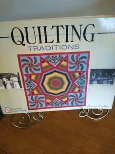 the book quilting traditions is on display