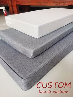 three mattresses stacked on top of each other with the words custom bench cushion above them