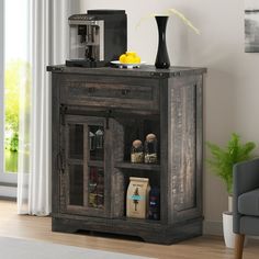 a wooden cabinet with glass doors and shelves