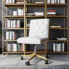 a white office chair sitting in front of a bookshelf