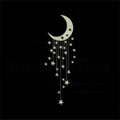 a crescent and stars hanging from the side of a black background with white writing on it