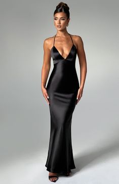 From engagement party to chapel ceremony, whatever the dress code, wear Delphine for every special occasion. Crafted in our premium non-stretch satin with a beautiful sheen, this maxi dress has a plunge halter neckline, super low scoop back with delicate elastic straps. Wear with a chic, undone hair up and metallic accessories. 



Colour: Black.

Premium non-stretch satin.

Plunge halter neckline.

Hook closure on neck.

Elastic straps to back.

Low scoop back.

Invisible zipper to reverse.

Ma Black Dress With Open Back, Long Backless Dress, Black Halter Neck Dress, Black Formal Dresses, Dark Fits, Chapel Ceremony, Homecoming Dresses Corset, Babyboo Fashion, Undone Hair