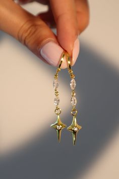 24K Gold Star Dangle Earrings – Cutethingscommin Gold Plated Drop Earrings, Ethereal Earrings Aesthetic, Dangling Star Earrings, Short Dangle Earrings, Gold Earrings Aesthetic, Dangling Earrings Gold, Silver And Gold Earrings, Star Dangle Earrings, Dope Jewelry Accessories