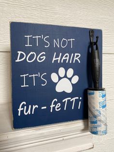 a sign that says it's not dog hair its fur - fetti