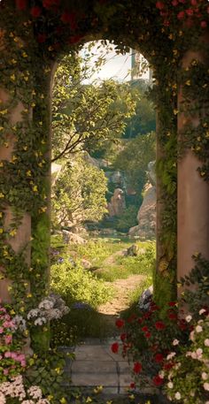 an archway with flowers and greenery surrounding it