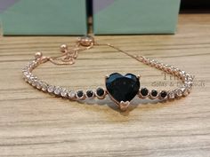 4.00CT Black Heart Diamond Bolo Bracelet, 14KT Rose Gold Plated, Round Moissanite Bolo Bracelet, Diamond Jewellery, Black Gemstone, Gifts Main Stone Shape : Heart Total Carat Weight : 4.00 Carat Gender : Female Metal Purity : 925 parts per 1000 Style : Bolo Bracelet Main Stone : Black Diamond !~ Secondary  Stone : Moissanite > Stone Shape : Brilliant cut > Main Stone Clarity : VVS1 > Stone Color : Near White > Cut Grade : Excellent !~ Metal : > Metal Type: 100% 925 Sterling Silver > Available Pl Ruby And Diamond Necklace, Black Diamond Bracelet, Bolo Bracelet, Bracelet Diamond, Artisan Bracelets, Gold Armband, Energy Bracelets, Heart Diamond, Wedding Jewelry Bracelets