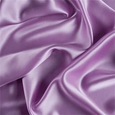 This 2 Way Stretch charmeuse satin its super soft and silky to the touch. The fabric is perfect for Dresses. This satin is light weight and it flows real good and drapes nice. The satin feels real silky and like real silk but it's made up of polyester and spandex tread. This satin can be use for wedding dresses-Prom dresses-nightgowns- linings-decorations and much more --- Create an incredible fashion statement and wrap yourself in your own design. Length:36 inches Width:58-60 inches 95% polyest Purple Fabrics, Lavender Fabric, Lavender Silk, Charmeuse Fabric, Club Color, Etsy Wedding Dress, Purple Satin, Purple Fabric, Purple Silk