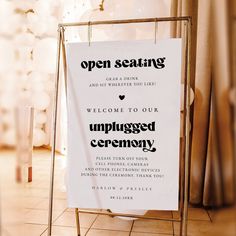 an open seating sign on display in a room