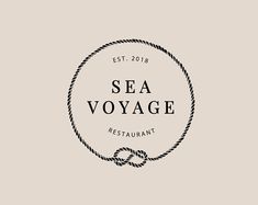 the sea voyage restaurant logo is shown in black and white, with rope around it