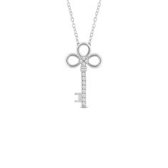 Within you is the key, and this diamond key necklace will remind you just that. Let your inner light shine bright and unlock your potential while wearing this beautiful necklace with a white gold pendant shaped like a vintage key and embellished with diamonds. Wear this every day and be reminded to keep your eyes open for opportunities. Elegant Sterling Silver Key Jewelry, Key Pendant Necklace Gold, Silver Key Pendant Necklace, Elegant Key Pendant Necklace, Diamond Key Pendant, Winding Key Necklace, Elegant Sterling Silver Key Necklace, Vintage Key Necklace, Silver Key Necklace