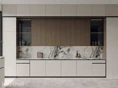 a kitchen with marble counter tops and cabinets