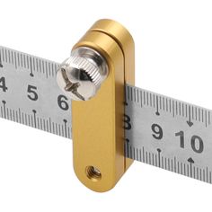 a measuring tape with a metal handle and knob on it's end is shown