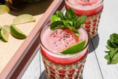 two glasses filled with watermelon and limeade