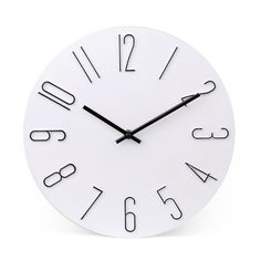 a white clock with black hands and numbers on the face is shown against a white background