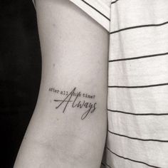 a woman with a tattoo on her arm that says, after all this time always