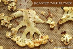 an image of roasted cauliflower on a baking sheet