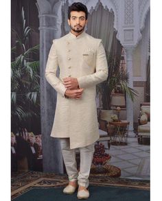 Cream nawabi men's sherwani. It comes with a dupion art silk Aligarhi style pant and faux satin inner. All sizes are available. Note- All accessories shown for photography purpose, Slight colour variation will possible & Self design may be vary. #white#crem#shervaniman#man#color#2022#wedding#function#festival#newyear Designer Sherwani For Men, Sherwani For Wedding, Mens Indo Western, Indowestern Sherwani, Men Sherwani, Ethenic Wear, Indian Sherwani, Western Suit, Groom Dress Men