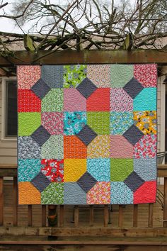 an image of a colorful quilt on the app store's web page, which is showing