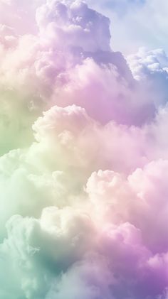 the sky is filled with lots of white and pink clouds in pastel colors,