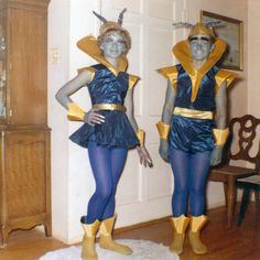 two people in costumes standing next to each other