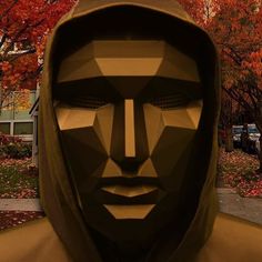 a man in a hoodie with his face cut out