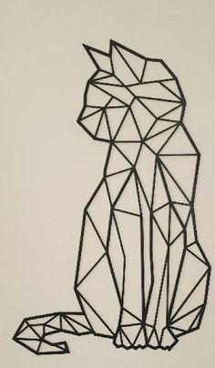 a cat made out of black wire on a white background with the outline cut out to look like it's sitting down