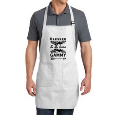 a man wearing an apron with the words, i'm proud to be a gamer