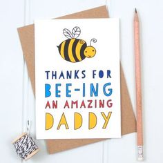 a card that says thanks for bee - ing an amazing daddy on it with a pencil next to it