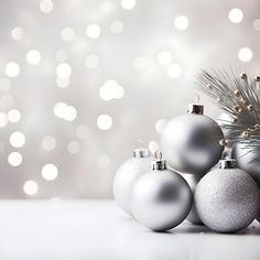 silver and white christmas ornaments against a blurry background