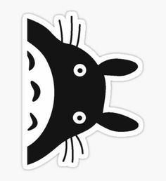 a black and white sticker with an image of a fish in it's mouth