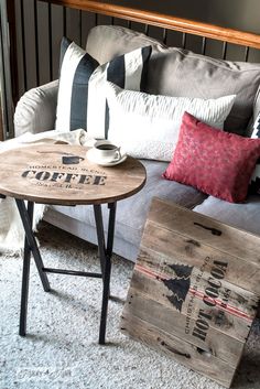 a coffee table sitting in front of a couch