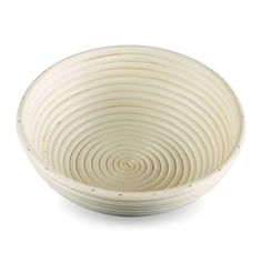 a white bowl with spiral design in the middle on a white background, it is isolated from the side