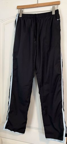 Nike Women’s Small Cotton Lined Windbreaker Track Pant Black/Lt. Blue Ankle Zip. Good condition no flaws. Box 36 Nike Windbreaker Pants, Wishlist 2022, 2023 Wishlist, Cute Sweatpants Outfit, Windbreaker Pants, Cute Sweatpants, Nike Track Pants, Sweatpants Outfit, Tracksuit Pants