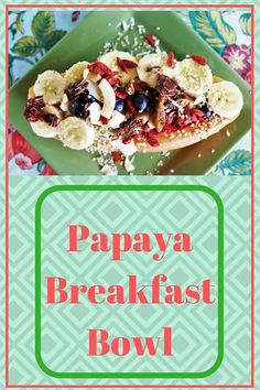 papaya breakfast bowl with bananas, blueberries and other toppings on a green plate