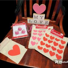 valentine's day crafts are displayed on a chair