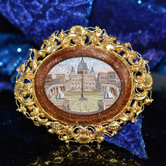 A ladies 15 karat yellow gold micro-mosaic brooch that features Saint Peters Square on an oval piece of Goldstone with an exquisite decorative gold border.  The brooch measures 2.25 inches long and 2 inches tall. St Peters Square, Saint Peter Square, St Peters, Saint Peter, The Vatican, Micro Mosaic, Gold Border, Grand Tour, Mens Accessories Fashion