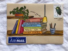 an airmail stamp with a drawing of books and a plant on top of it