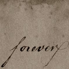 the word forever written in cursive writing on a piece of paper with ink