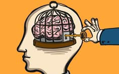 a person holding a key to a caged brain