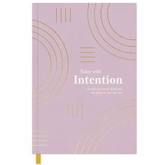 a pink notebook with gold lines and the words, today with intention