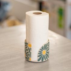 a roll of toilet paper sitting on top of a counter