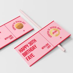 two pink birthday cards with chopsticks on them