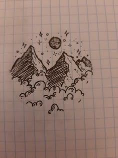 a drawing of mountains and clouds with the moon in the sky above them on a sheet of paper